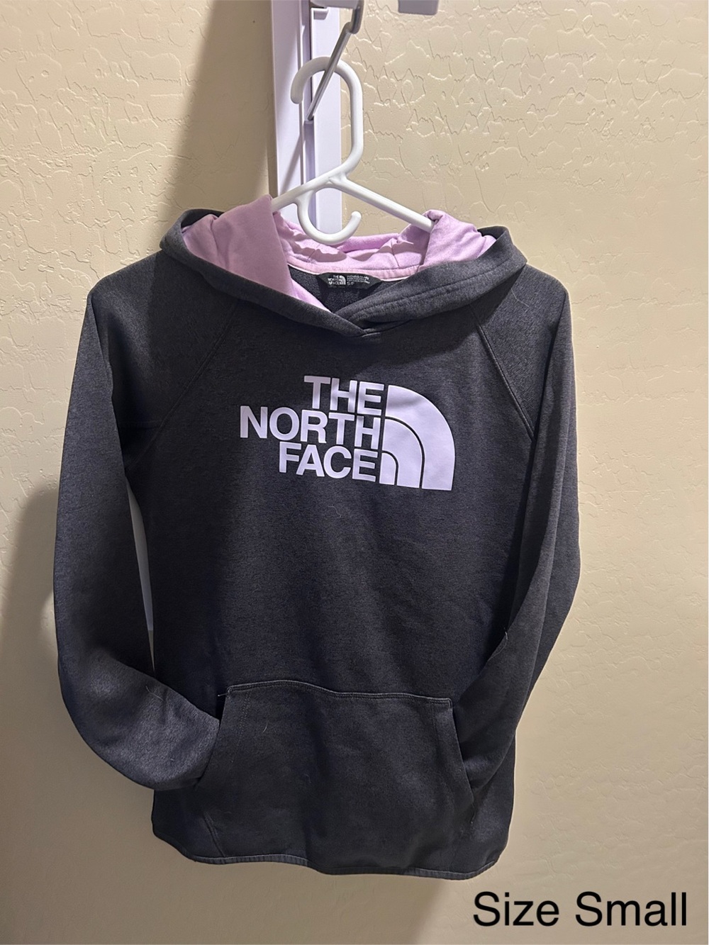 The North Face Charcoal Hoodie with lilac purple lining